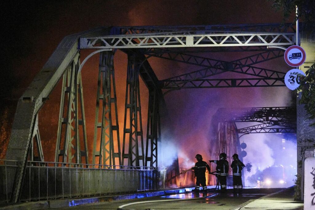 Blaze damages historic bridge spanning Tiber River in Rome