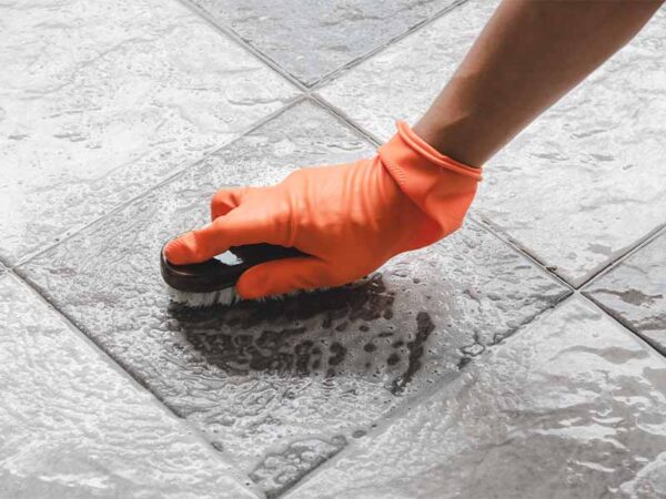 Cleaning tiles and grout without harming the surface